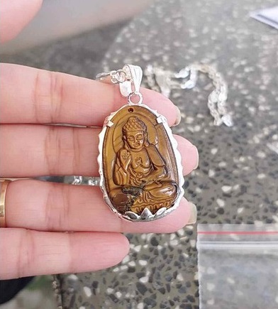 Mặt dây chuyền phật bản mệnh mắt hổ bọc bạc