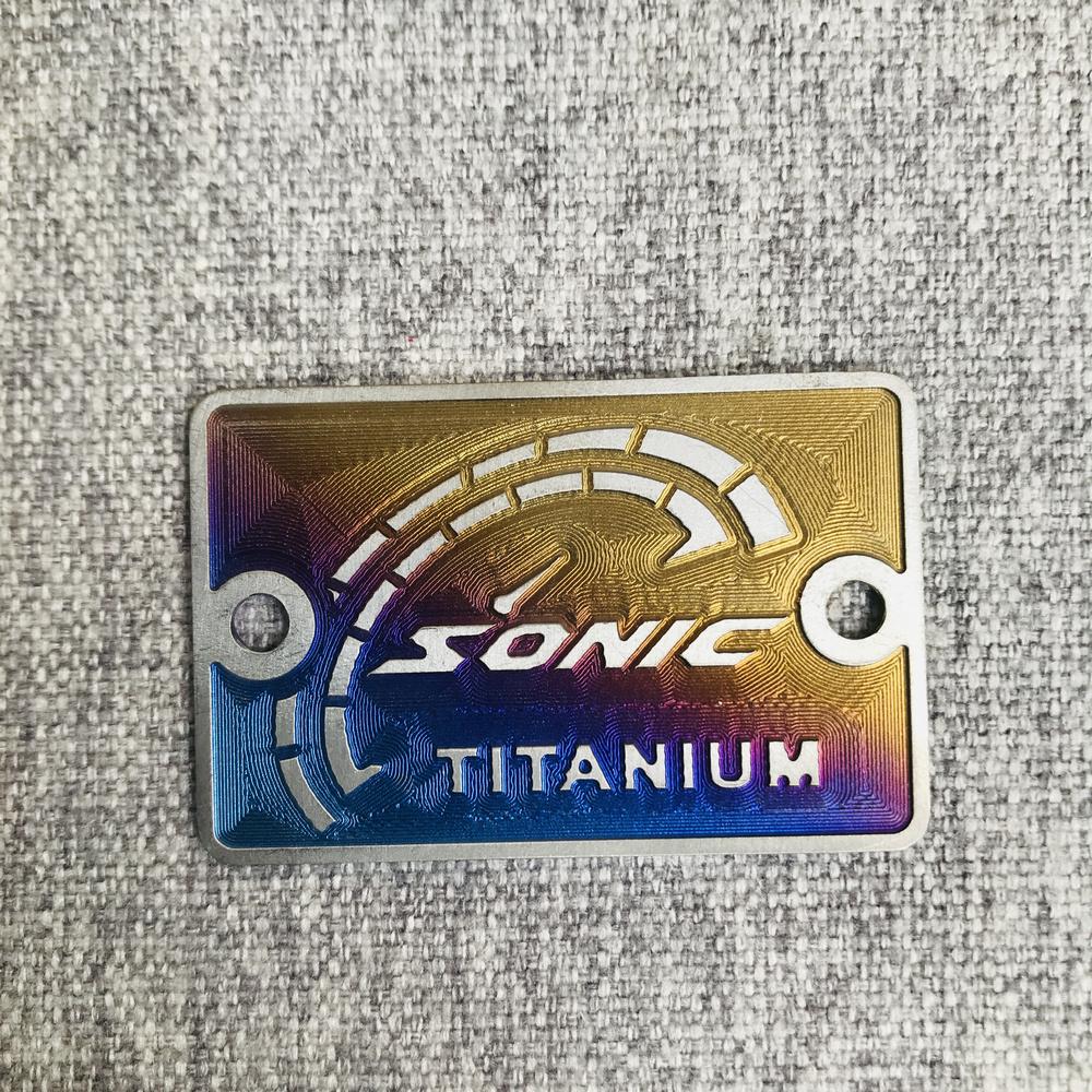 [HCM]TEM TITAN DÁN BÌNH DẦU TRANG TRÍ XE SATRIA  (TITAN 100%)