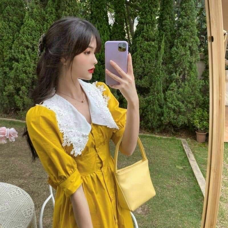 Đầm nút vàng cổ bèo nơ lưng