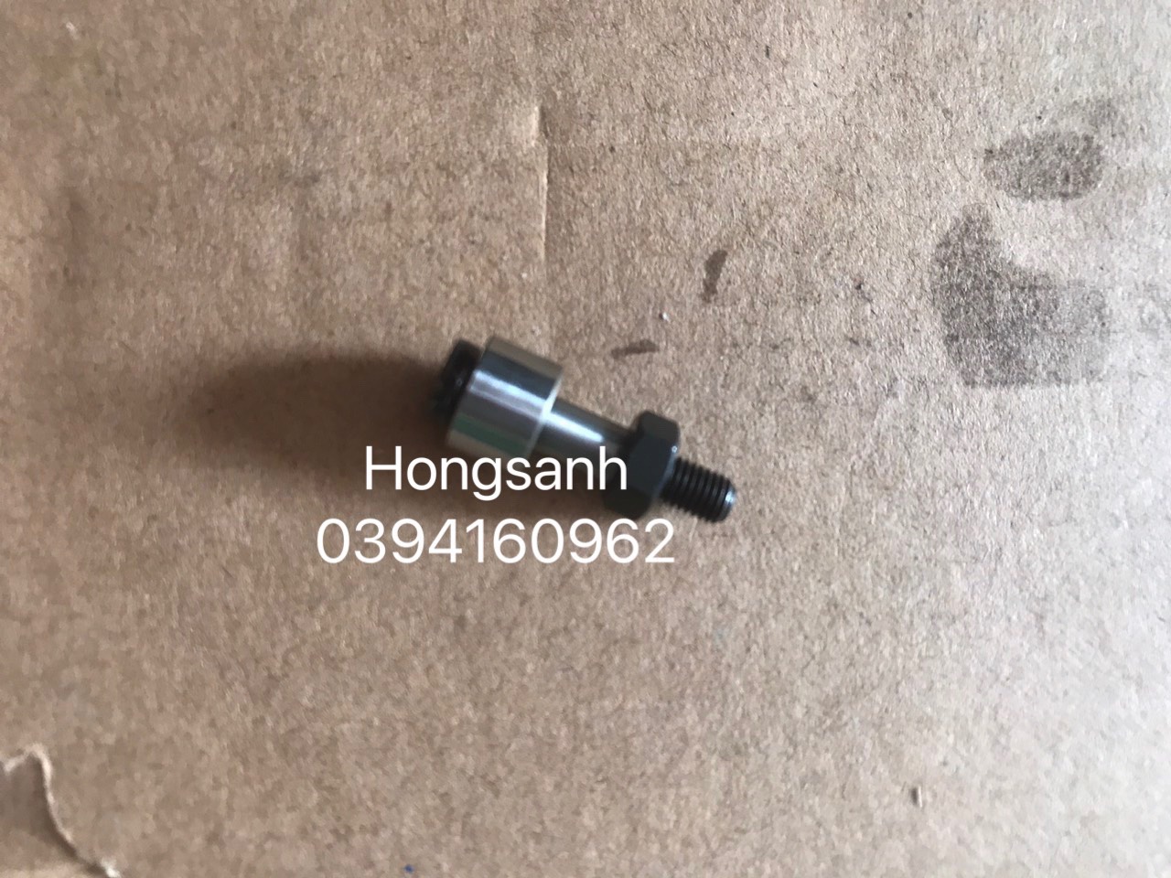 Bi cam máy may bao Newlong