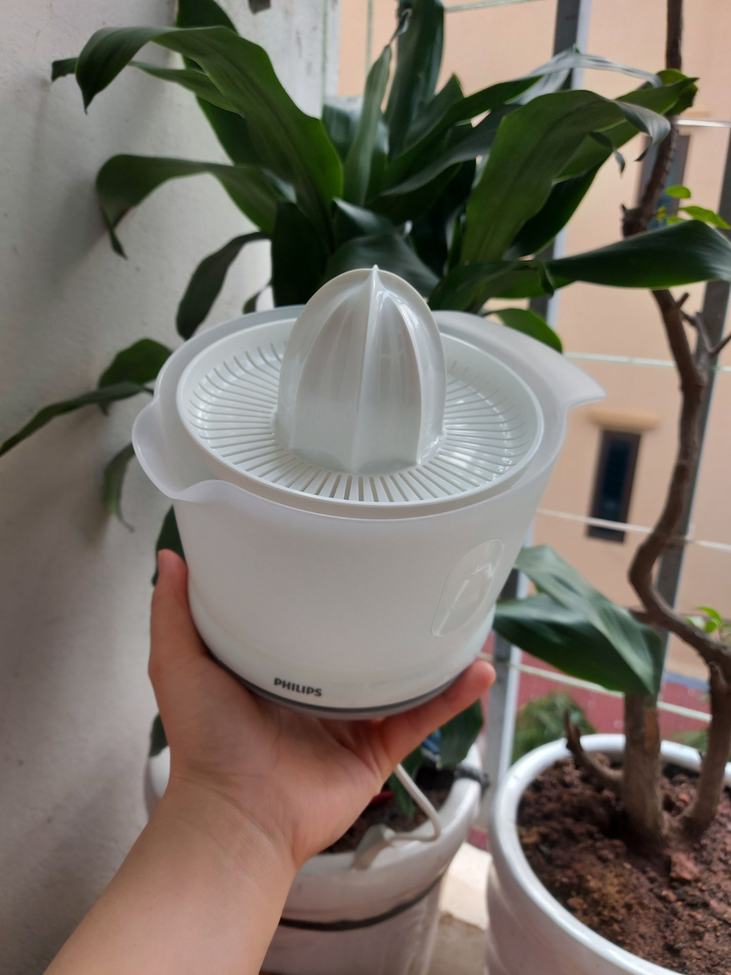 Máy vắt cam philips HR2738