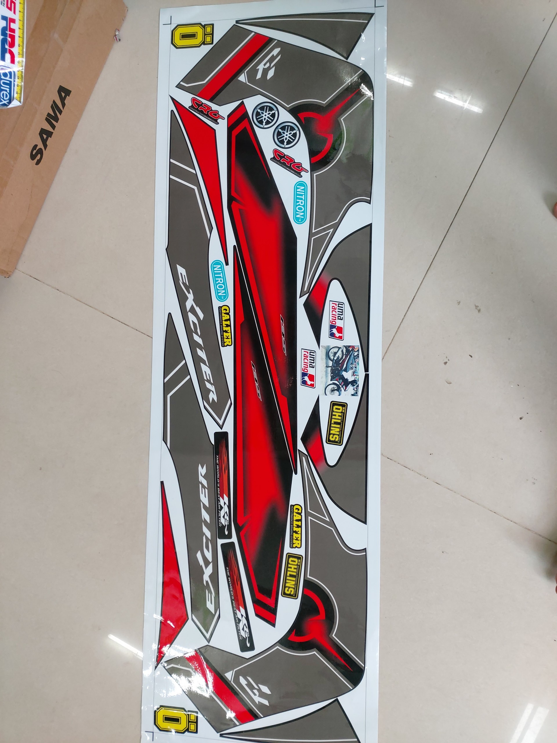 Tem xe exciter 2010 mẫu thái tặng logo