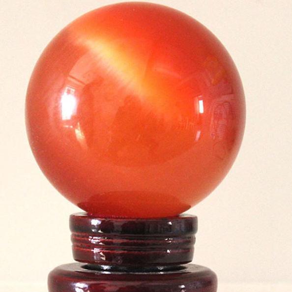 [HCM]QUẢ CẦU PHONG THỦY ĐÁ MẮT MÈO ĐỎ ĐƯỜNG KÍNH 12CM + TẶNG KÈM CHÂN ĐẾ