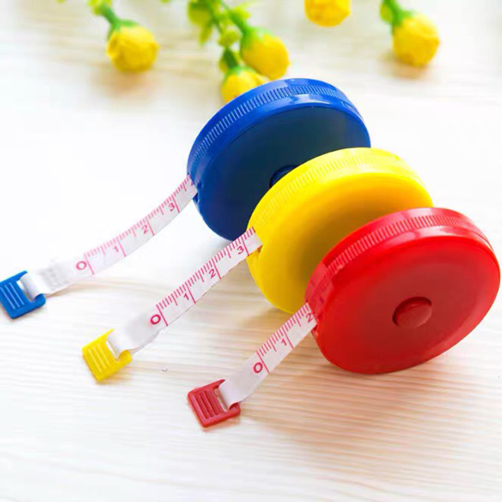 Thước đo cuộn mini - thước dây rút đo quần áo 1,5m .