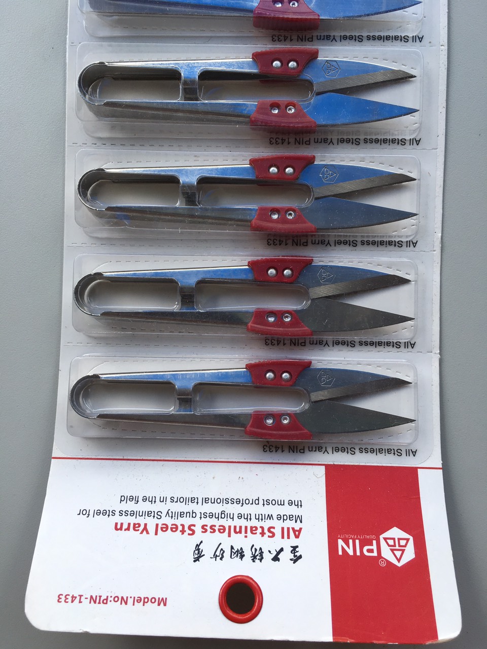 Kéo bấm chỉ INOX có tay đệm đỏ hiệu Pin