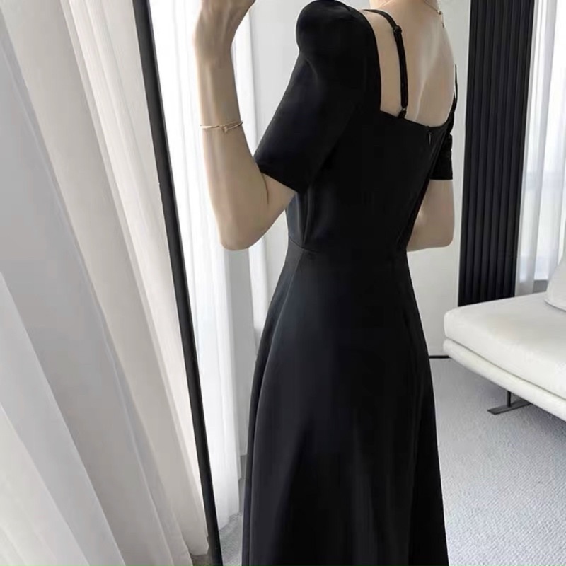 Đầm đen cổ V dây vai