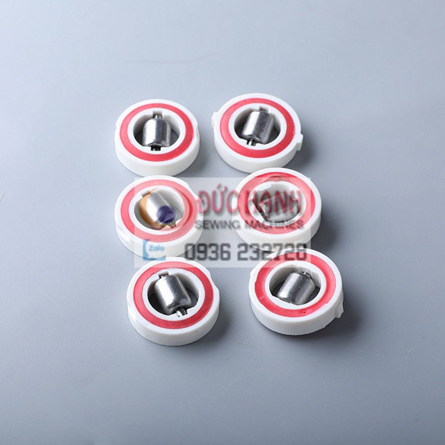 BÁNH XE MÁY CẮT VẢI ĐỨNG EASTMAN & KM