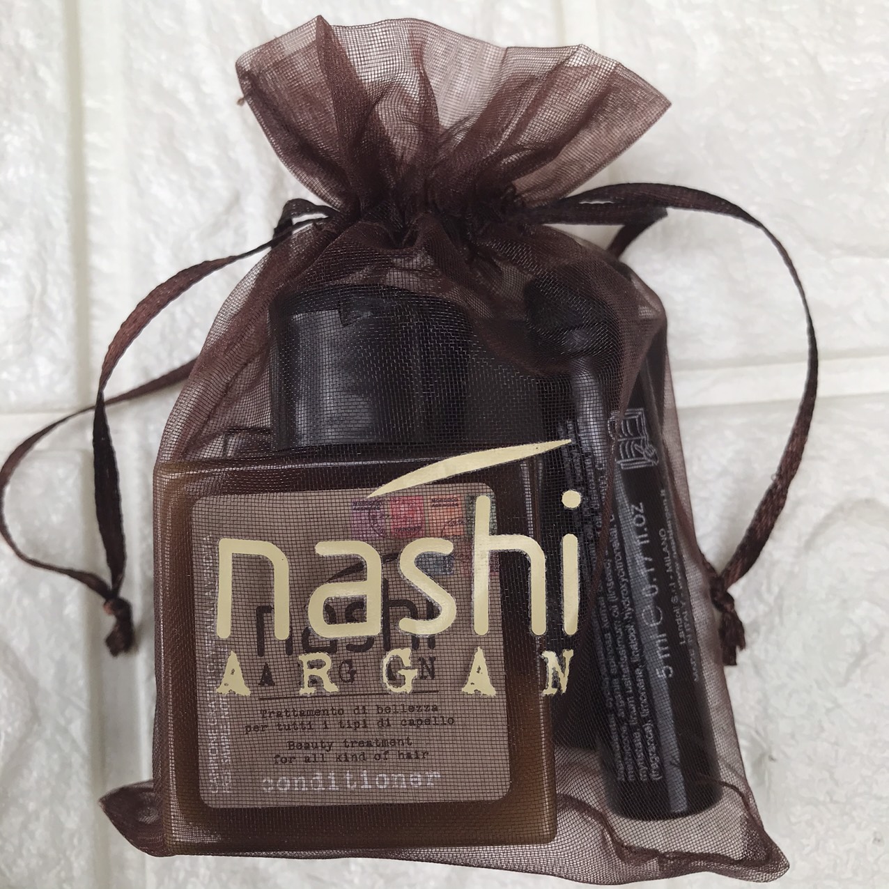 Bộ Nashi Argan Mini phục hồi tóc hư tổn ( Gội 30ml + Xả 30ml + Tinh dầu 5ml)