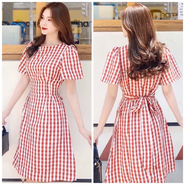 Đầm caro đỏ to cột nơ sau
