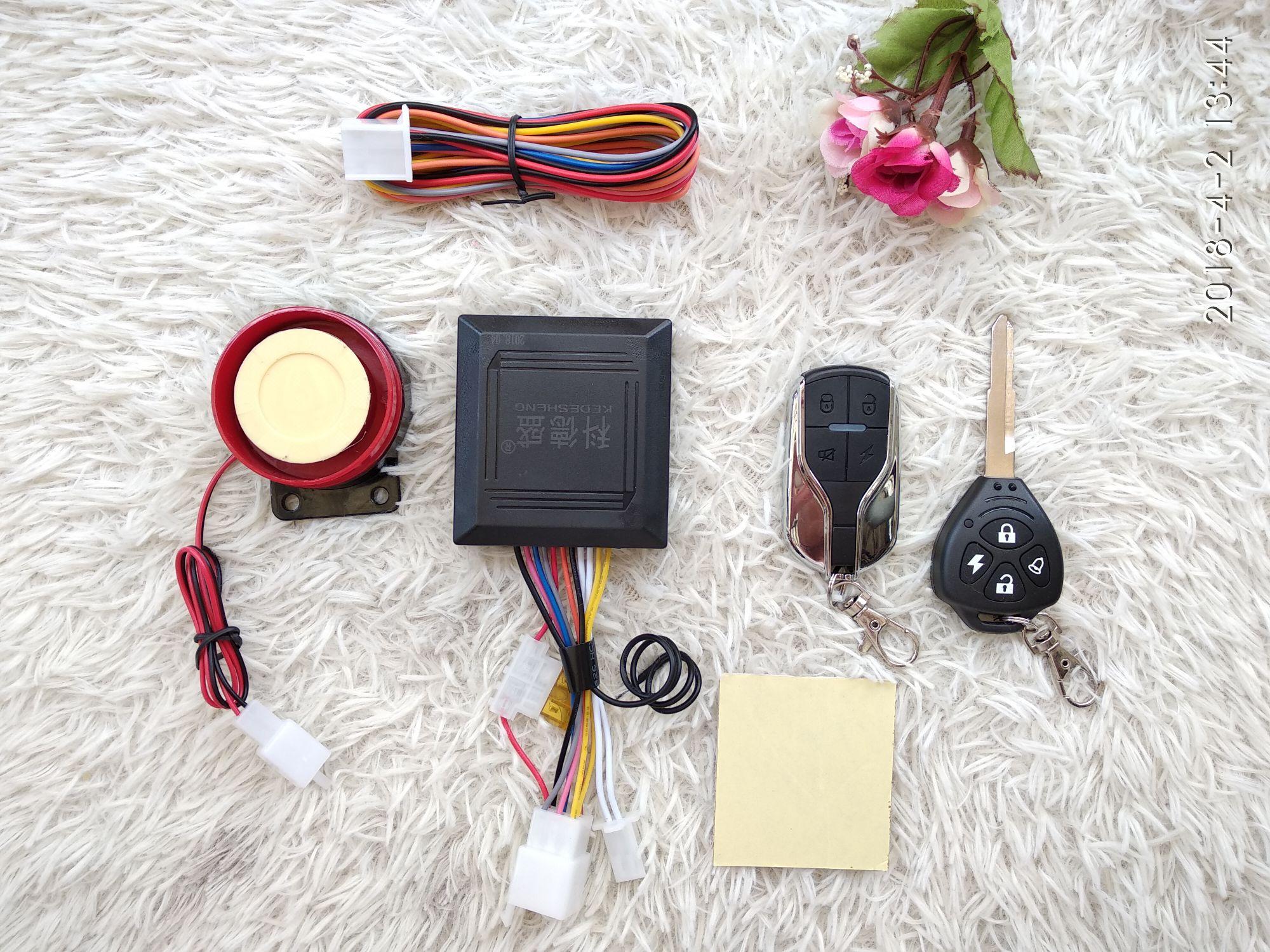 Khóa chống trộm xe máy 4 nút 1 chìa 1 remote TA-04A