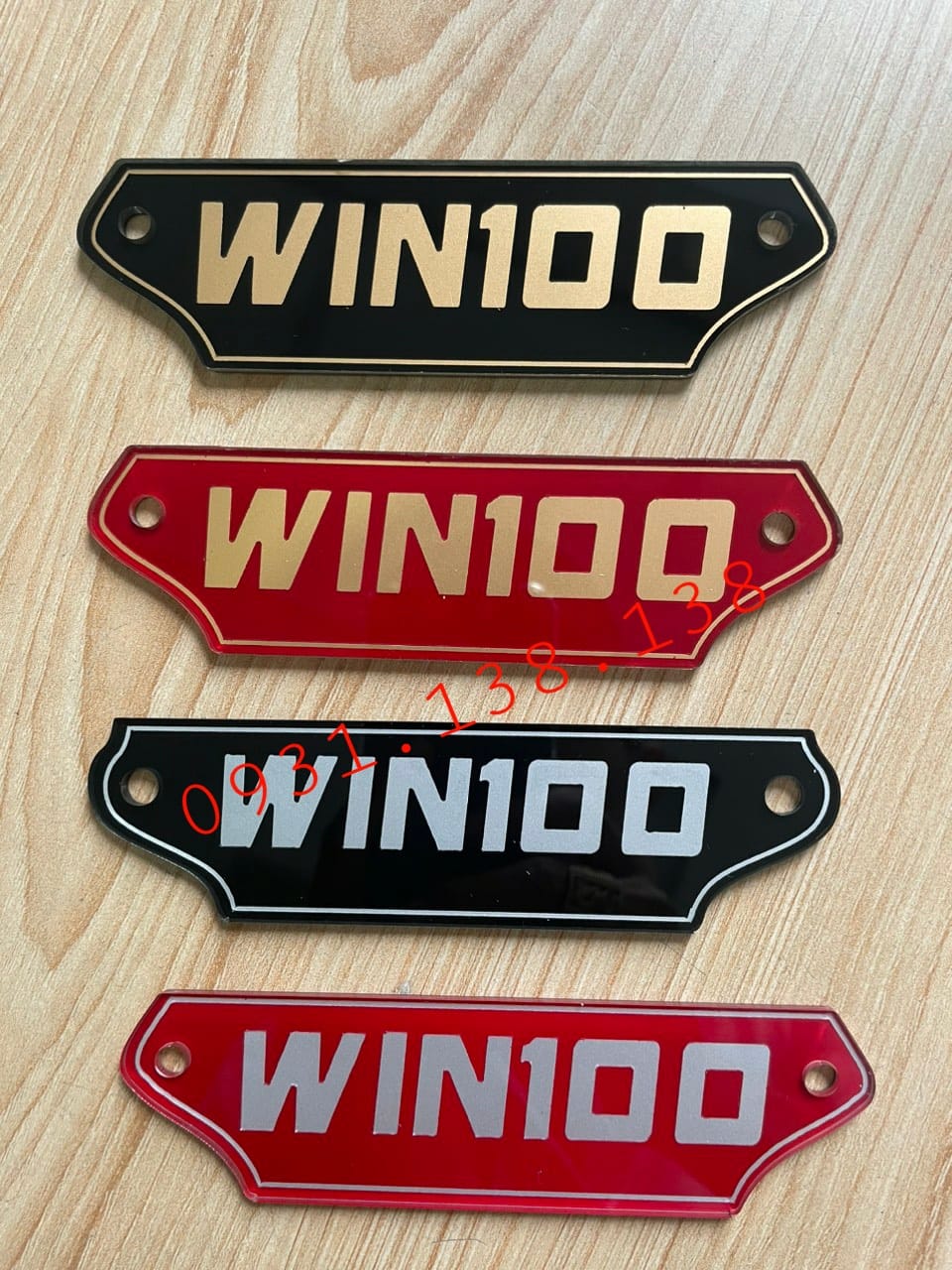 logo chữ gắn xe máy Win 100cc lên xe rất đẹp