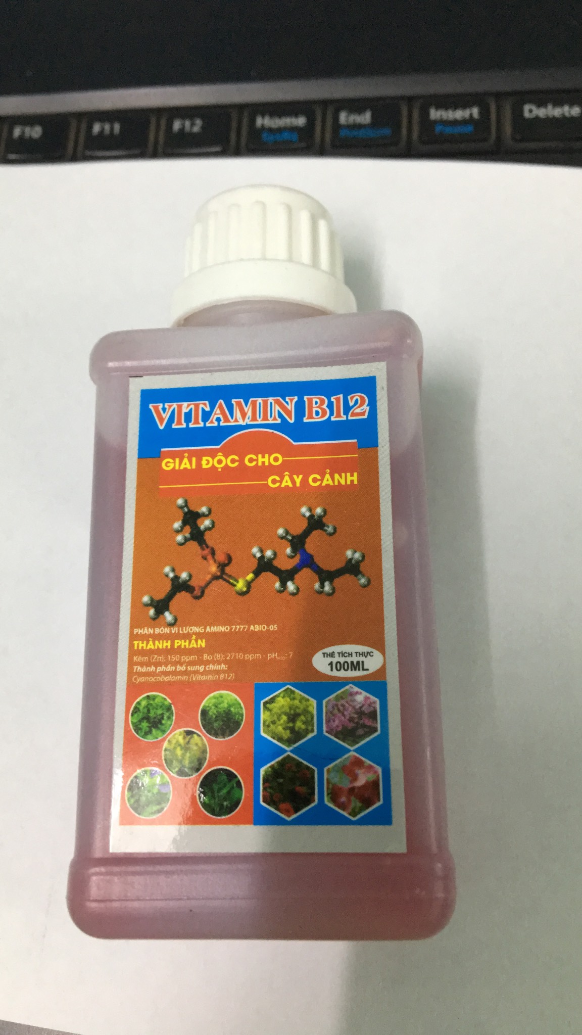 sản phẩm vitamin B12 TD lọ 100ml cho hoa lan cây cảnh