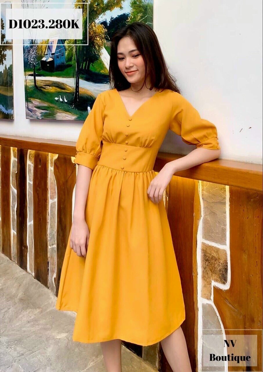 đầm xòe cổ tim tay phồng bọc nút