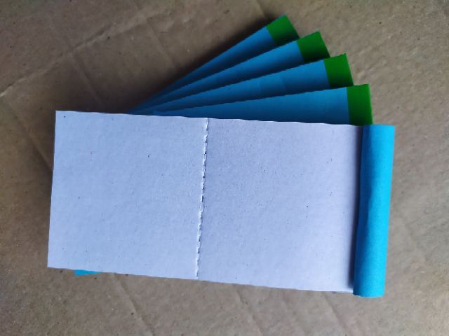 sổ Cùi xé dài, 6.5*15cm, 1 liên răng cưa giữa ( 10 cuốn)
