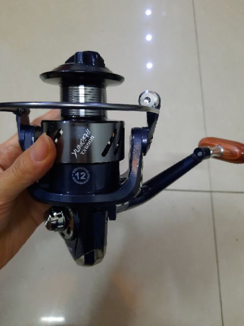 Máy câu cá kim loại tx 3000-7000  (xả hàng giảm giá và cam kết bảo hành đổi trả ạ)