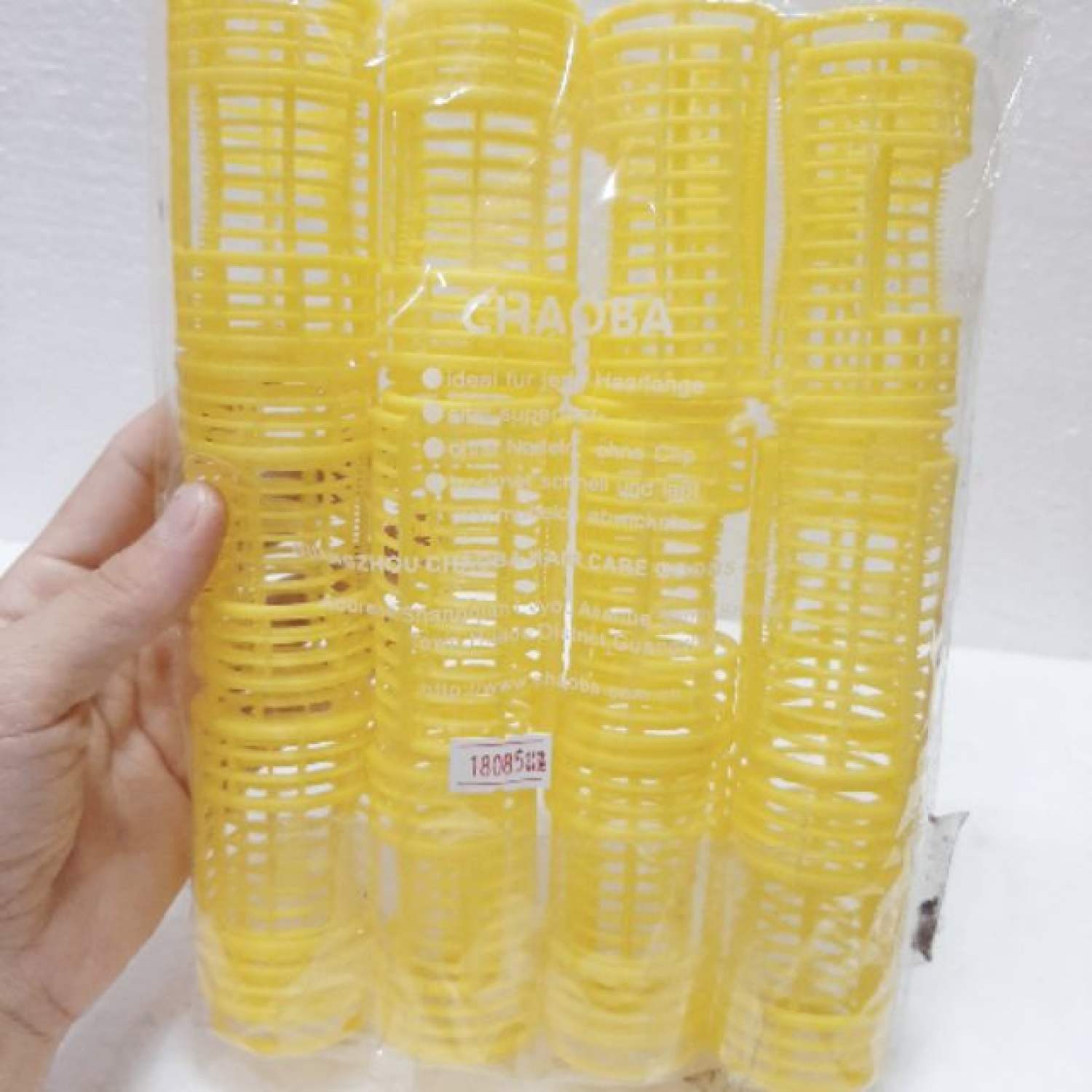 Set 12 lô dính có kẹp giữ tạo tóc xoăn uốn lọn