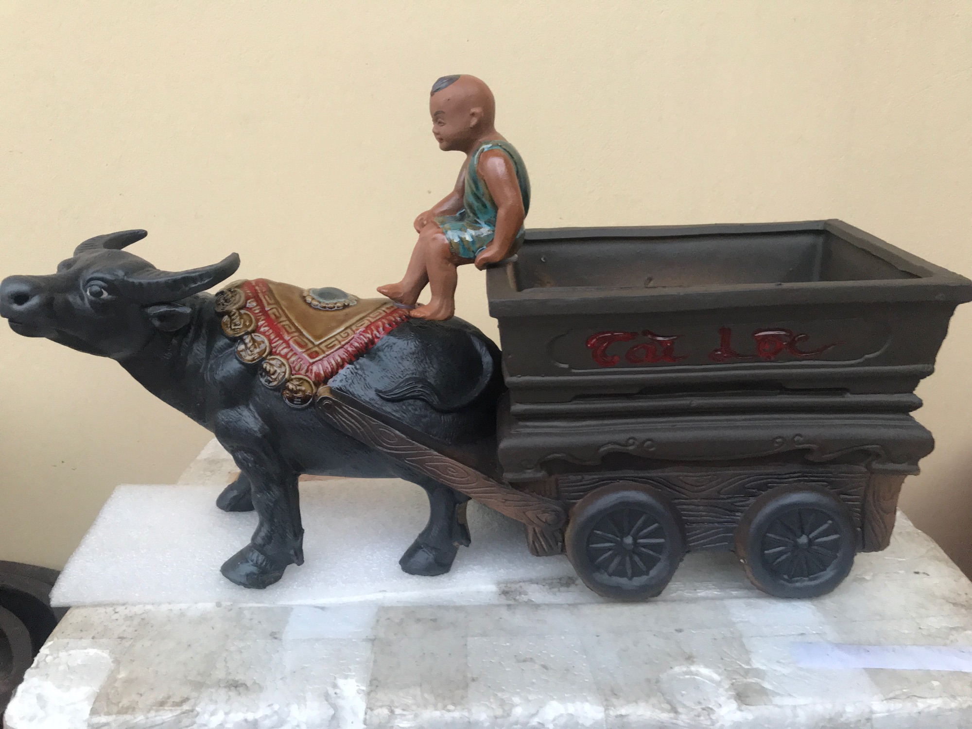 Em bé chăn trâu kéo Tài Lộc
