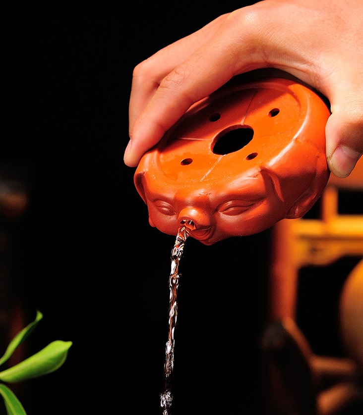 Đôn voi mini cõng ấm trà , chén, chậu bonsai