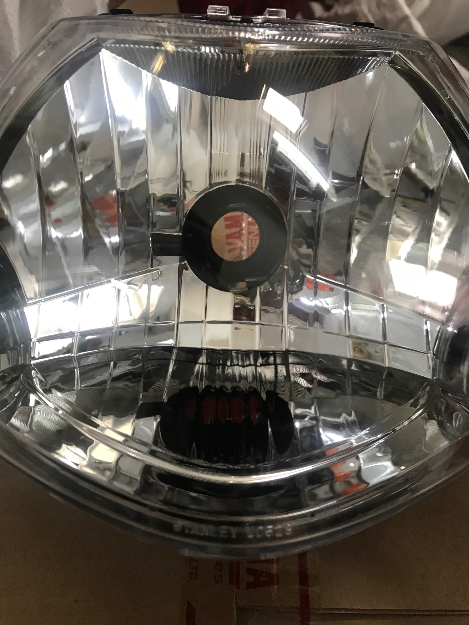 Pha đèn trước ( choá đèn) xe Sirius Fi hãng Yamaha