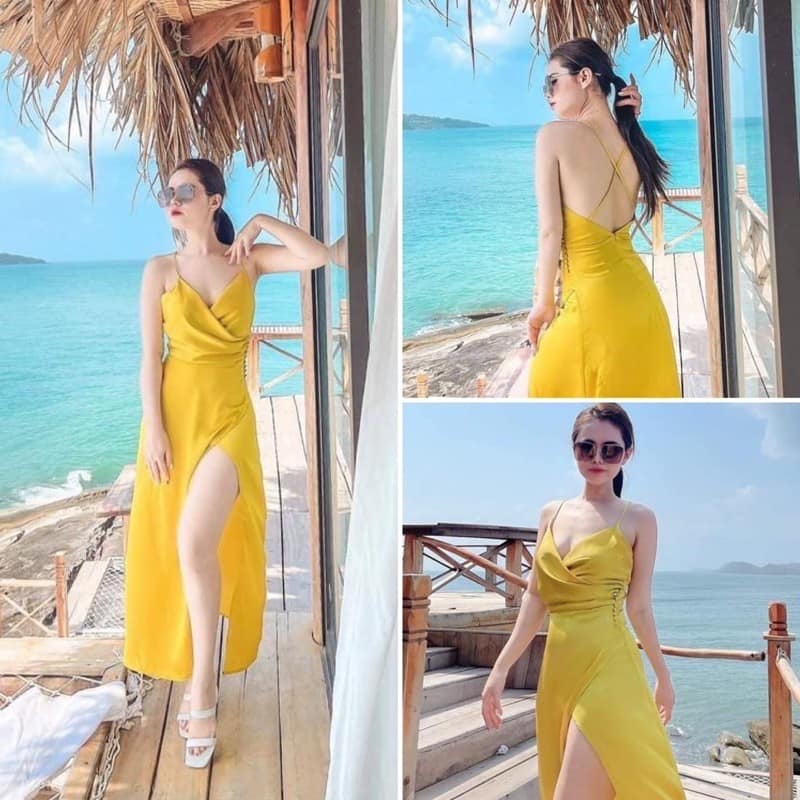 Đầm maxi vàng hai dây đắp chéo xẻ tà phối nút eo dây chéo lưng