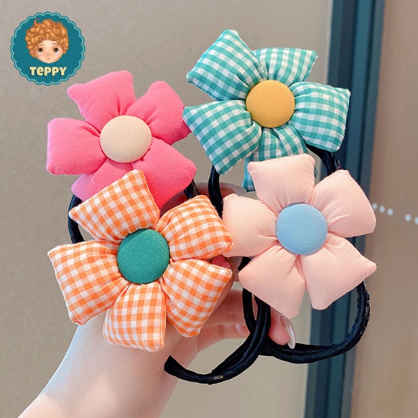 Cột tóc, búi tóc cho bé gái hình bông hoa