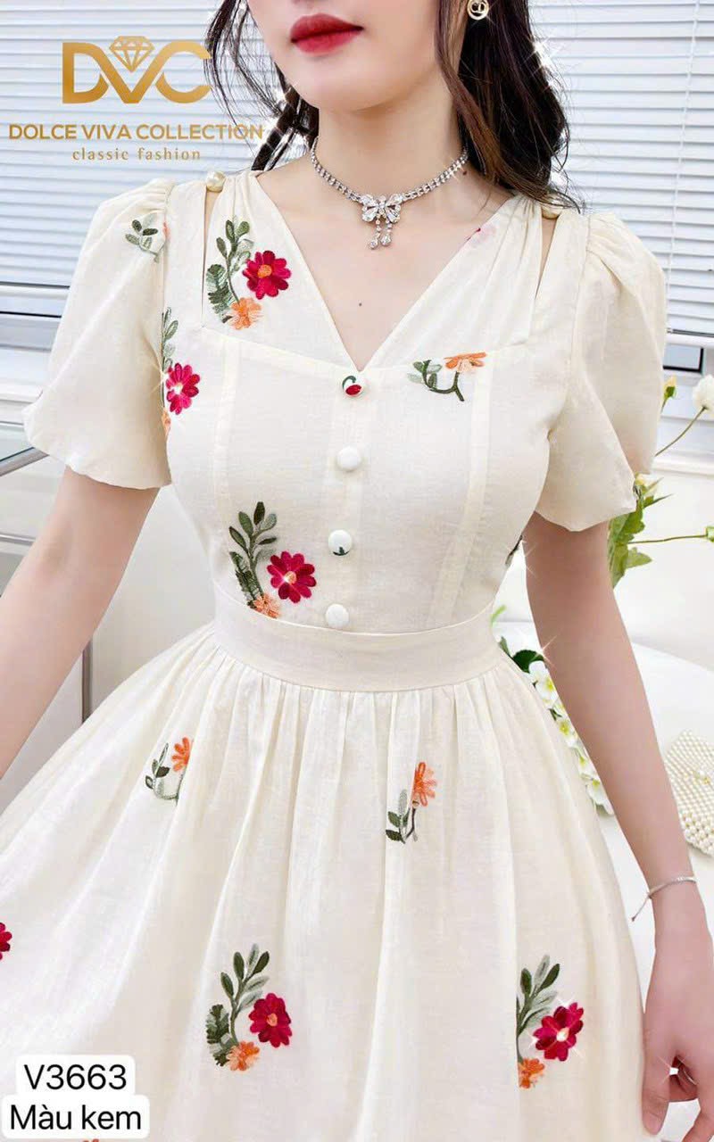 Đầm xòe xốp hoa tay phồng nút bọc cổ tim