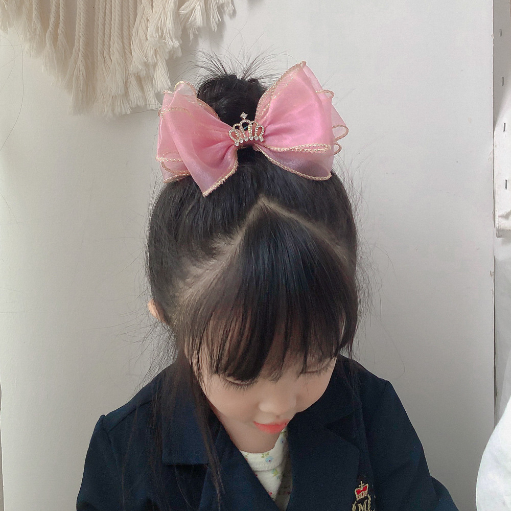 Kẹp tóc vương miện nơ voan cho bé gái