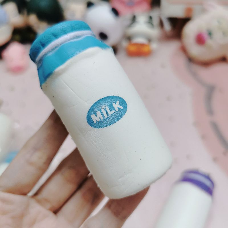 Đồ Chơi Bóp Mềm Bình Sữa Chất Chậm Tăng