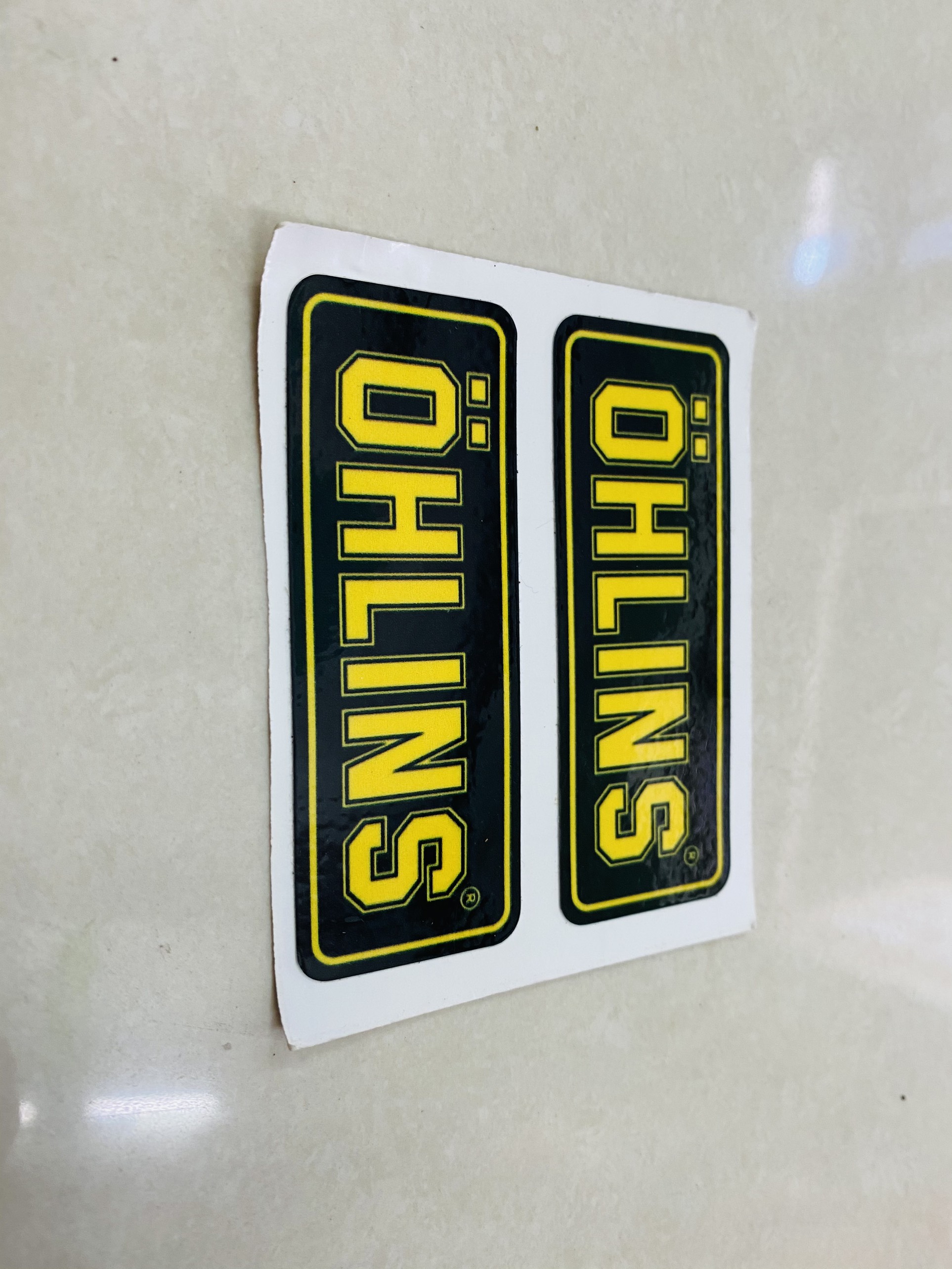 cặp tem ohlins vàng