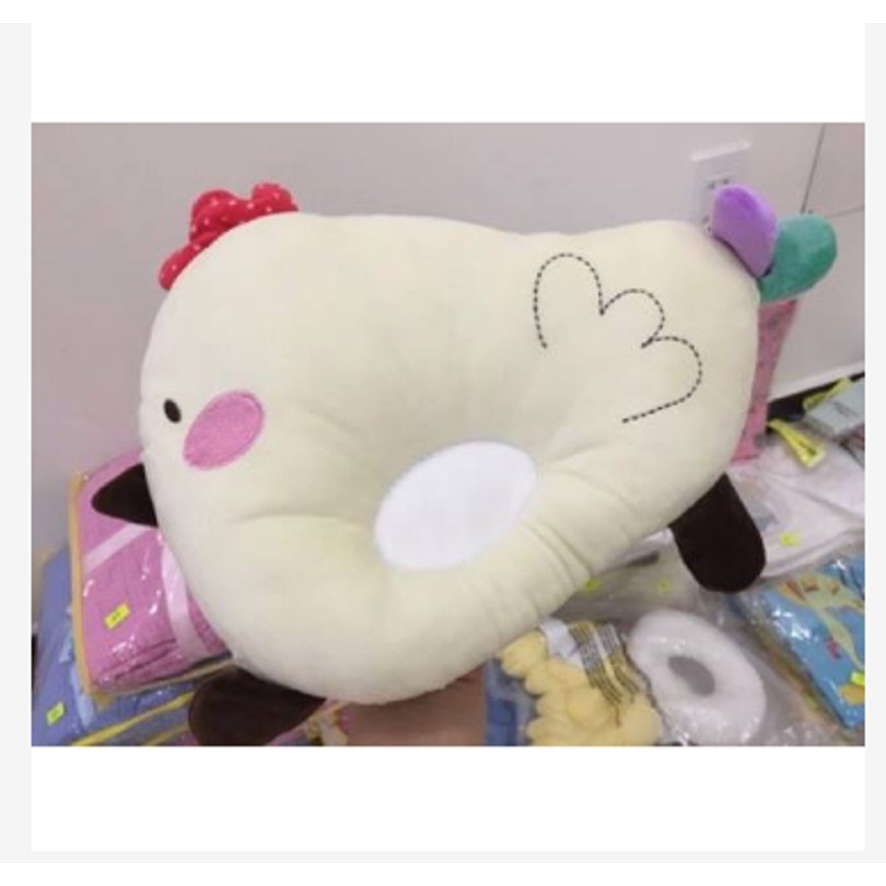 Gối lõm sơ sinh hình chú gà