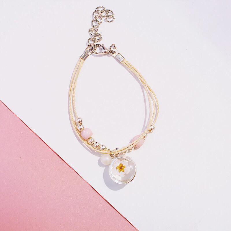 Lắc tay nữ dây dù hạt hoa MS01