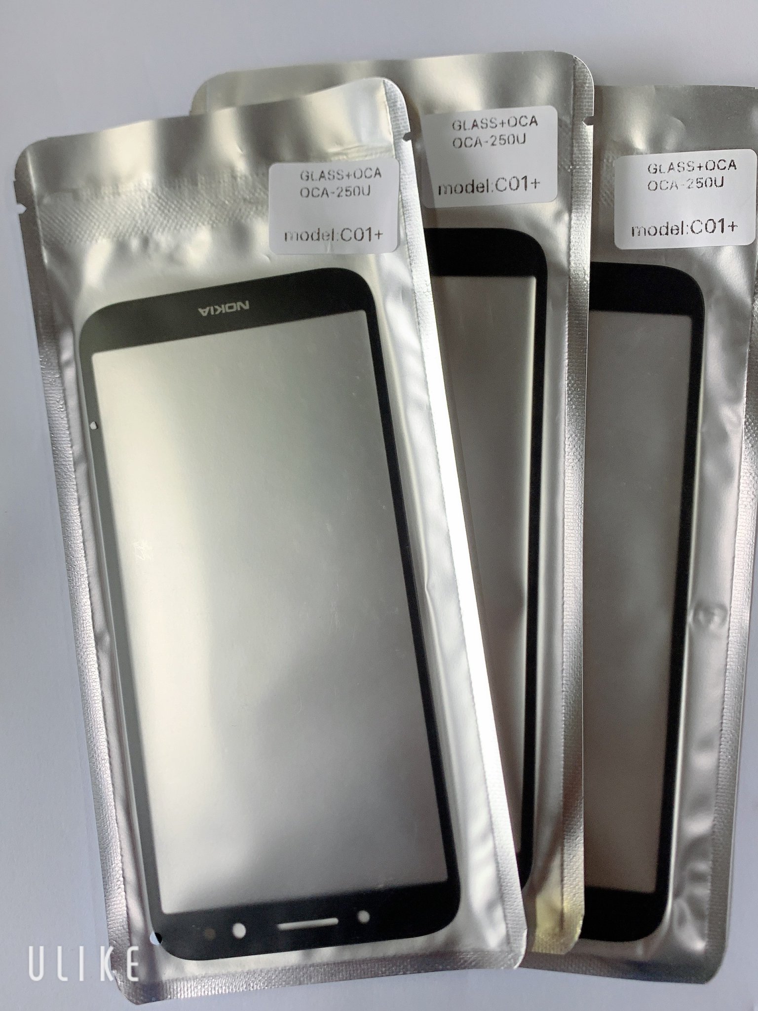 Mặt kính nokia c01 plus - mặt kính zin new màu đen, vào keo oca sẵn, ép kính