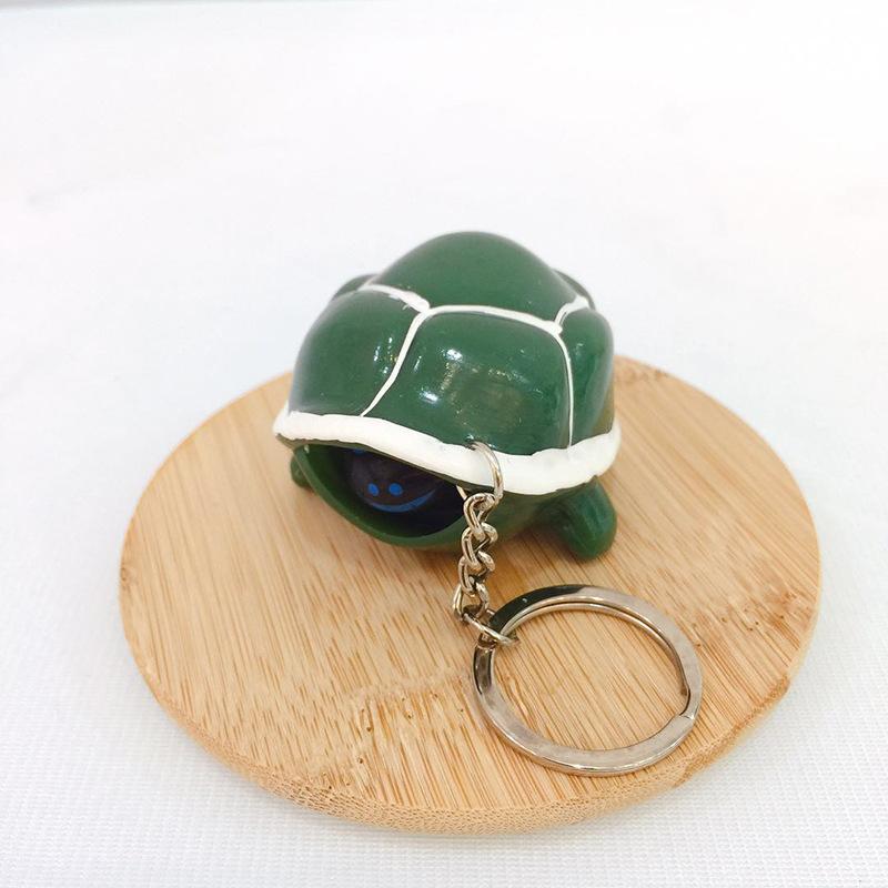 Móc khóa bóp rùa thụt đầu