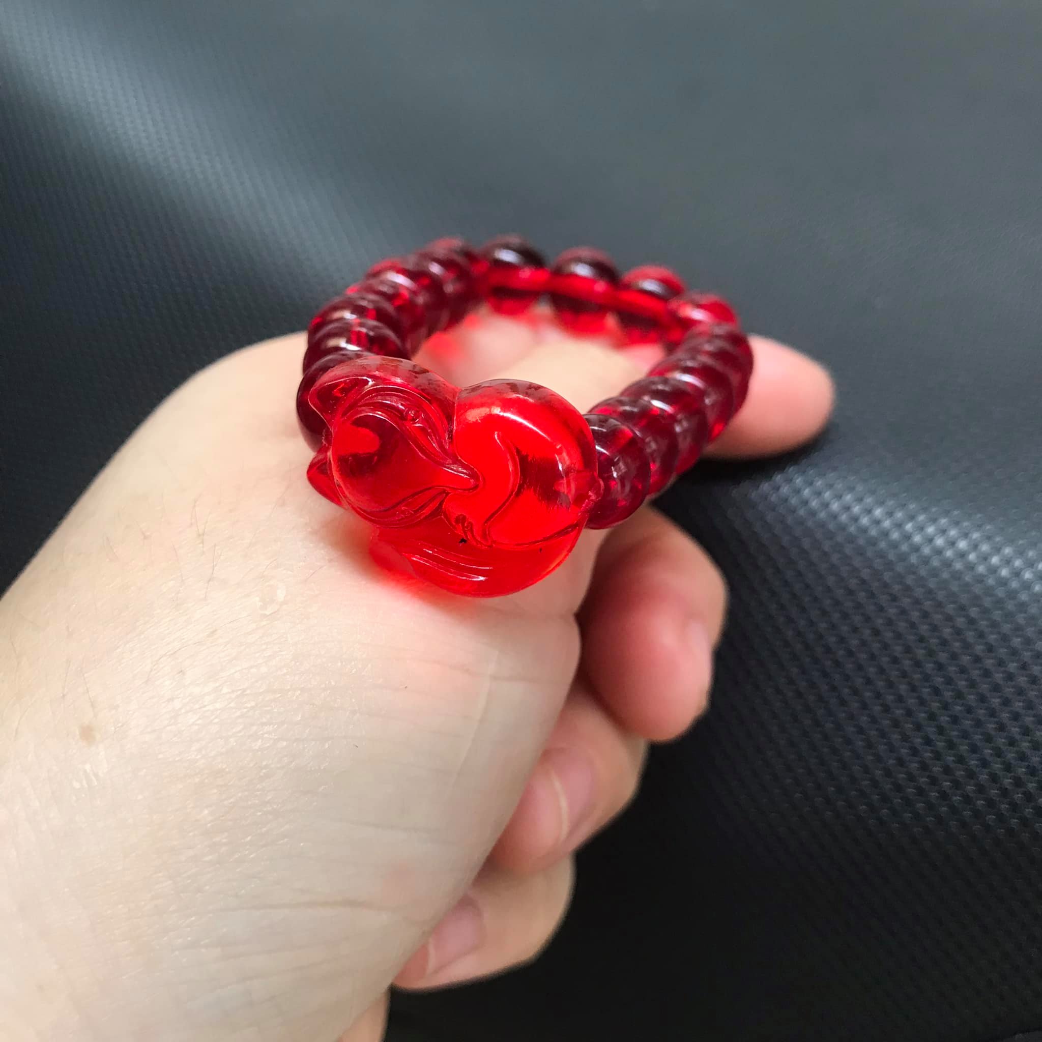 VÒNG TAY HỒ LY ĐÁ POLY ĐỎ