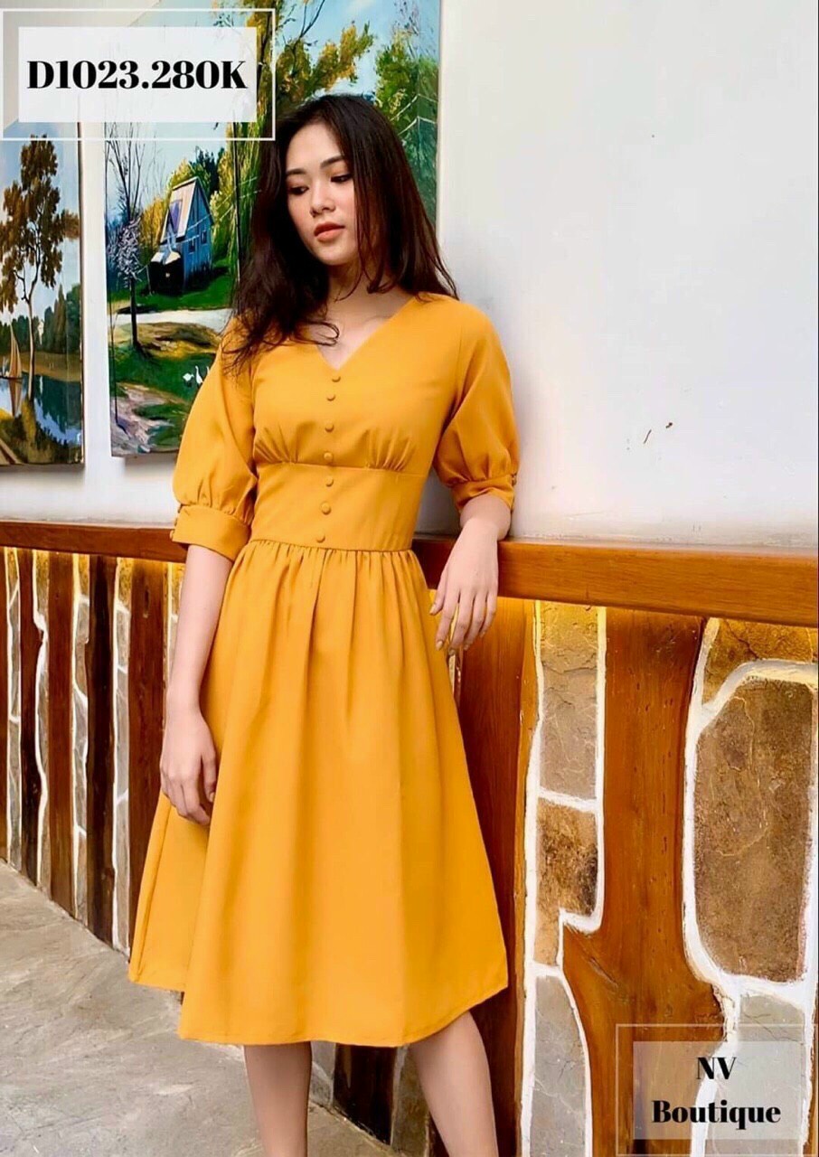 đầm xòe cổ tim tay phồng bọc nút