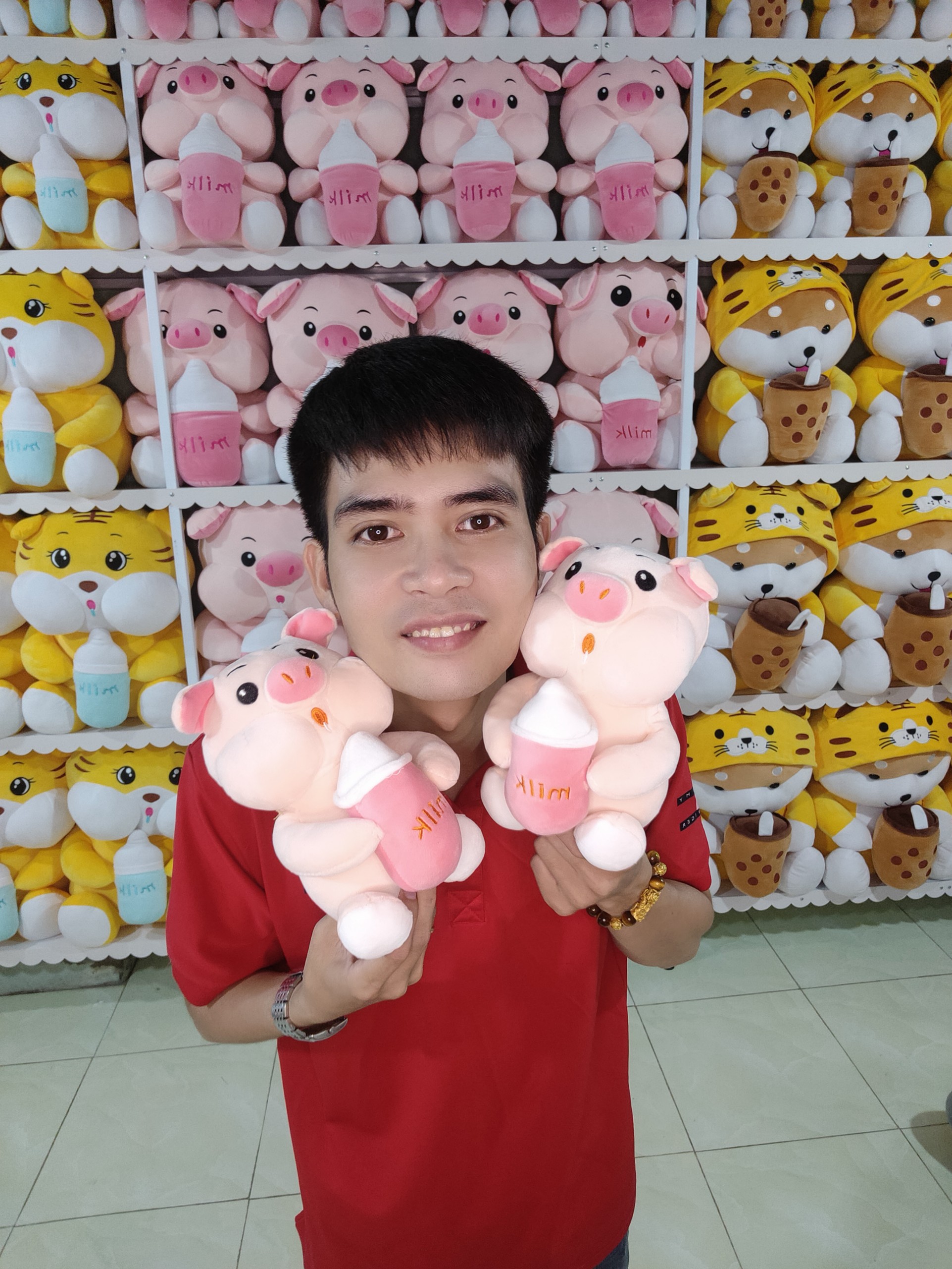Heo Ôm Bình Sữa Gấu Bông Dễ Thương