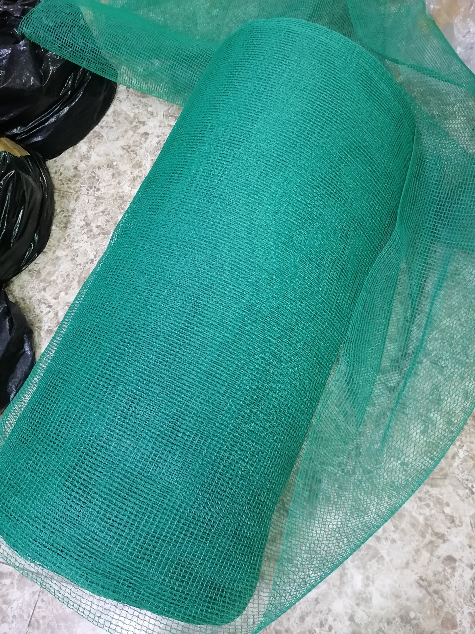 Lưới lỗ 3mm, màu xanh ngọc - chiều cao 7 tất bán theo mét dài tới.