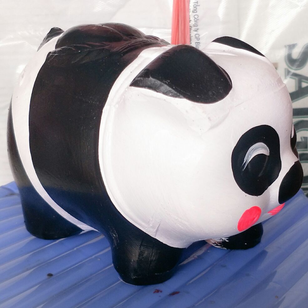 heo đất, ống tiền, heo đất chó đốm đen