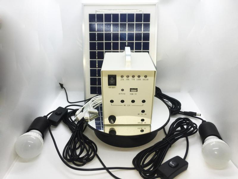 Máy phát điện mini năng lượng mặt trời dùng 5W cho 2 bóng + Sạc cho điện thoại + cỏng ra 12vol