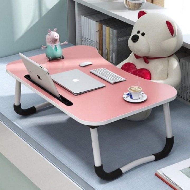Folding study table compact has slot for iPad