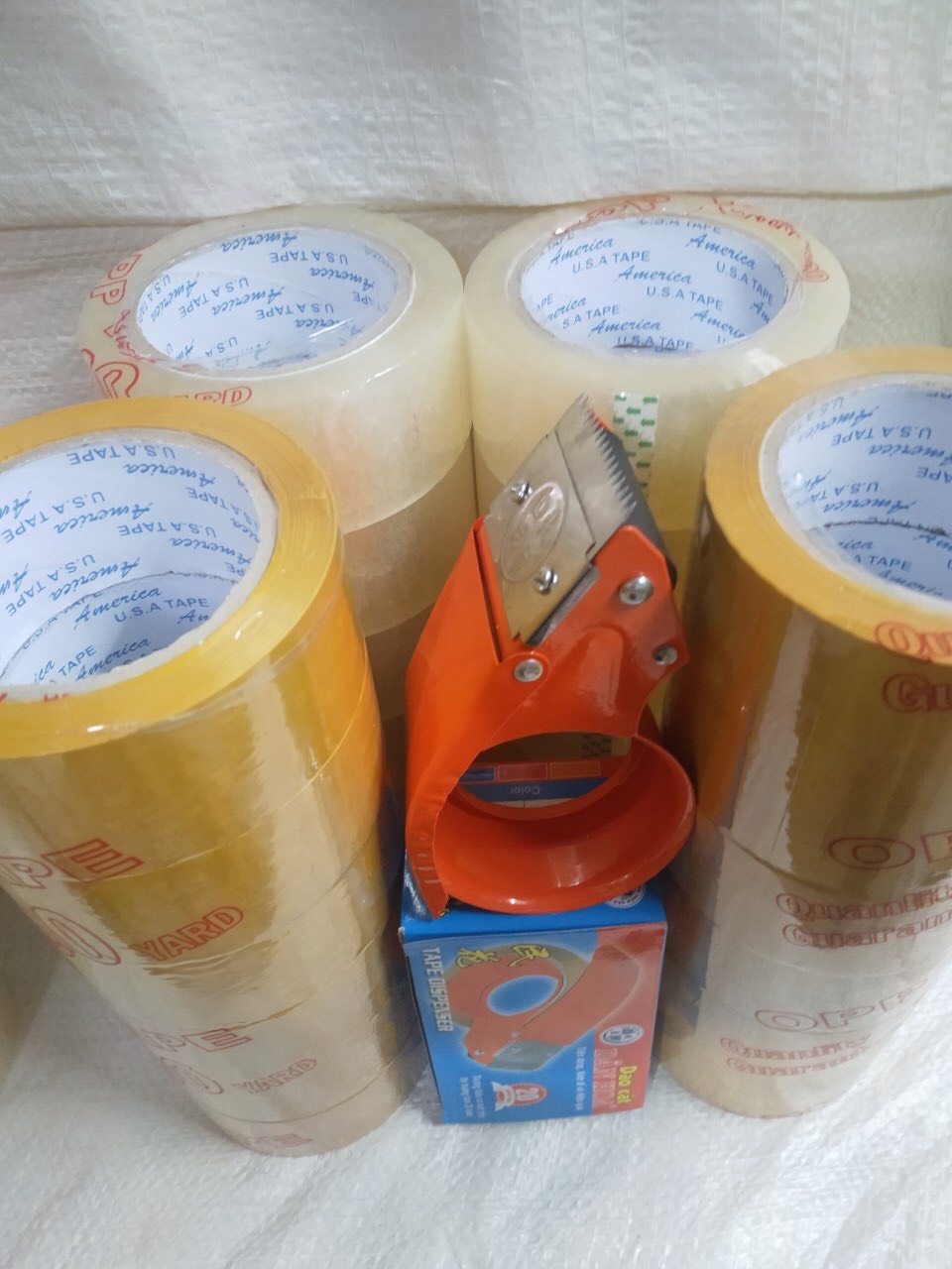 1 cây băng keo: trong - đục 100yard (6 cuộn)
