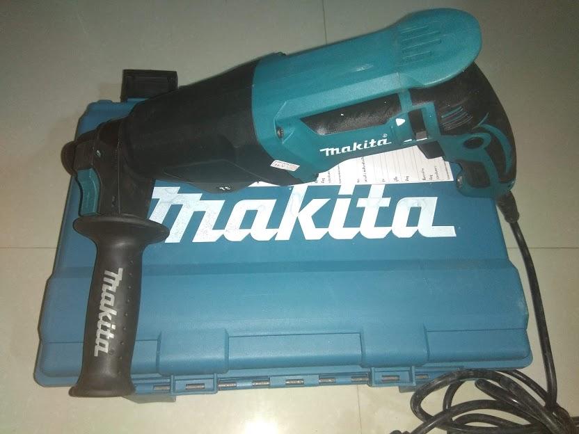 Máy khoan bê tông Makita HR2610 Madein TháiLan, 1000W đủ 3 chức năng khoan sắt, gỗ, khoan bê tông và đục bê tông.