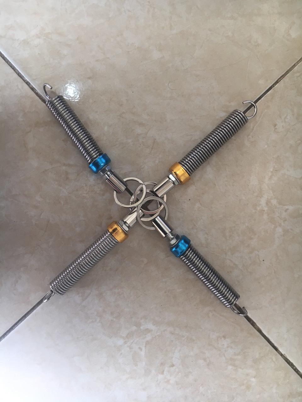 Lò xo mở cốp