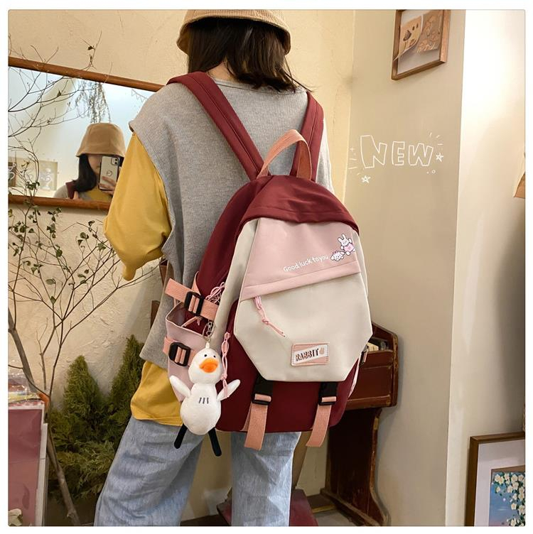 Balo Guofei trơn vải chống thấm phối màu tặng móc khóa vịt bông