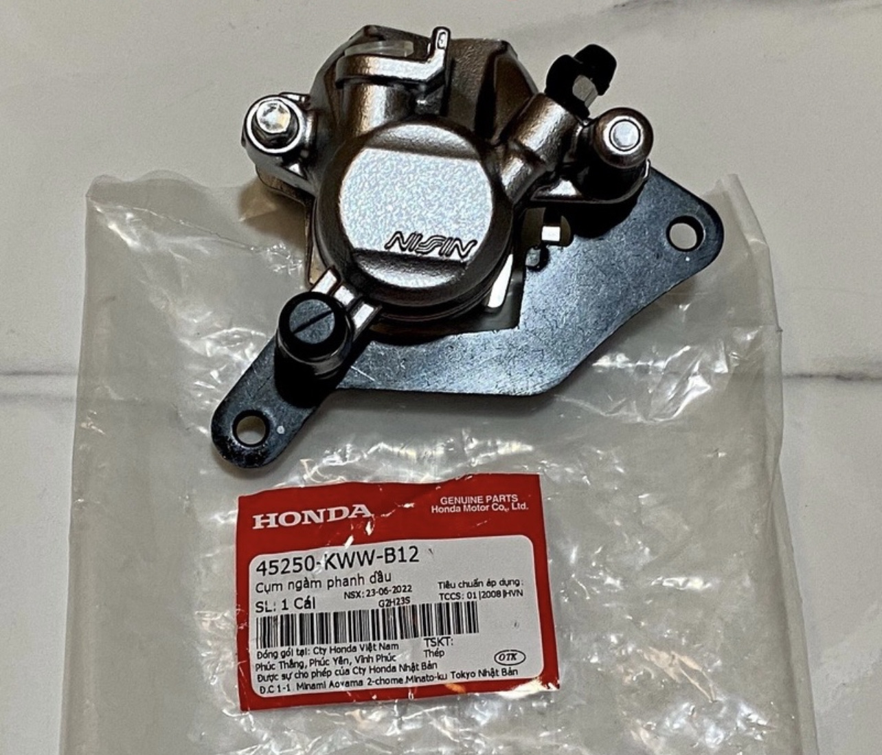 Củ Dầu Dưới Ws110, Rsx 110, Wave Blade, Fu 125 Honda ( 45250KWWB12 )