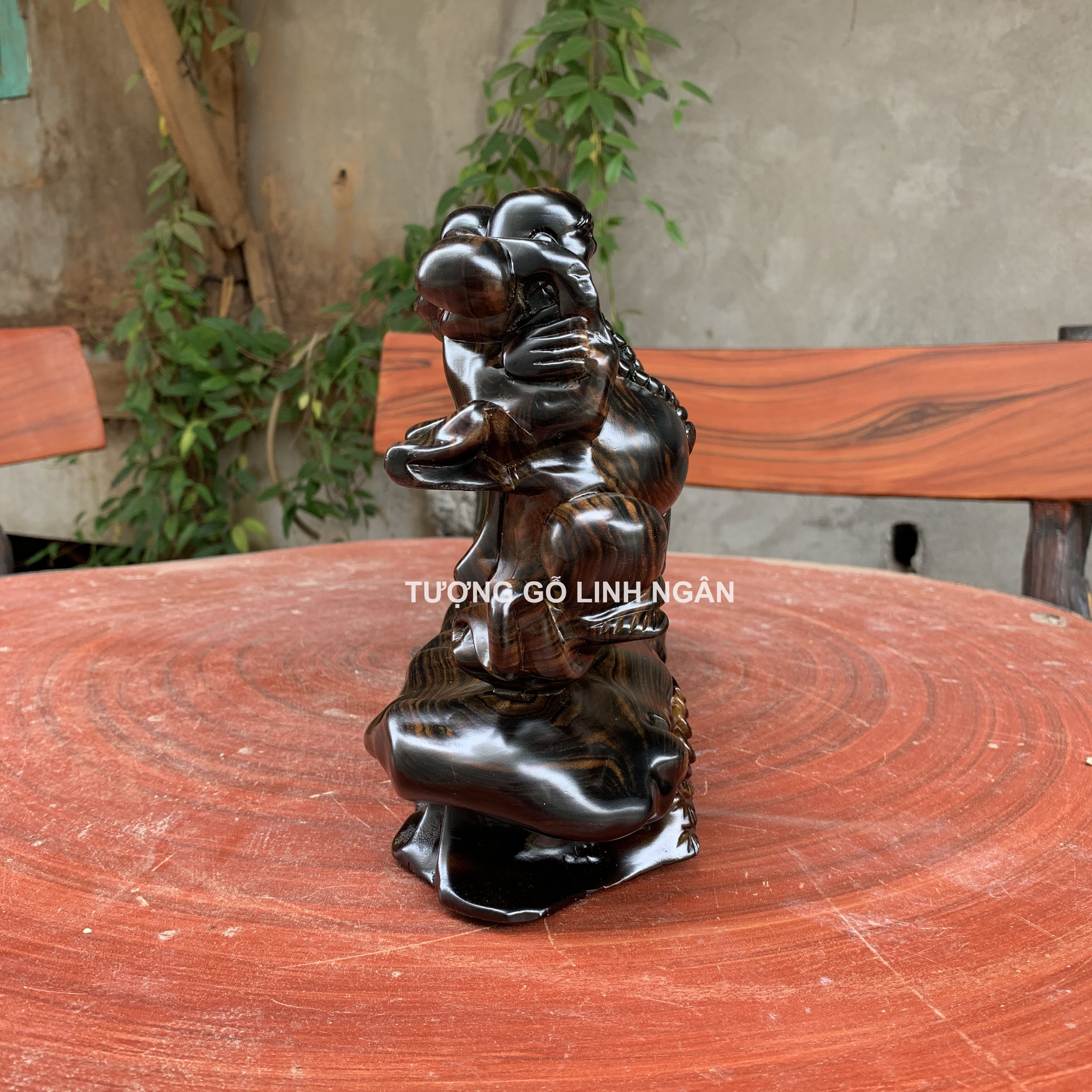 Tượng phật Di lặc gỗ Mun (Cao 20 cm, ngang 40 cm, sâu 10 cm)