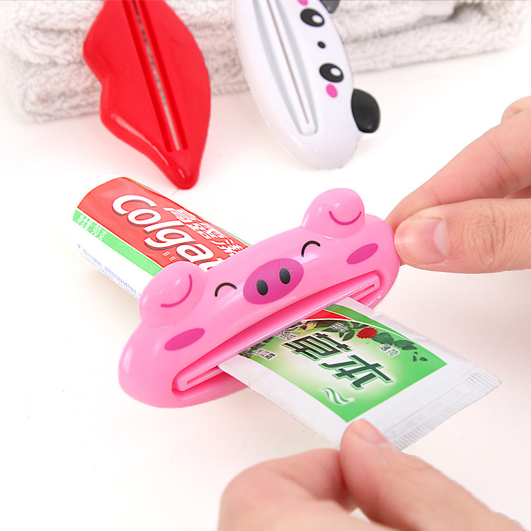 Dụng cụ kẹp kem đánh răng hình thú
