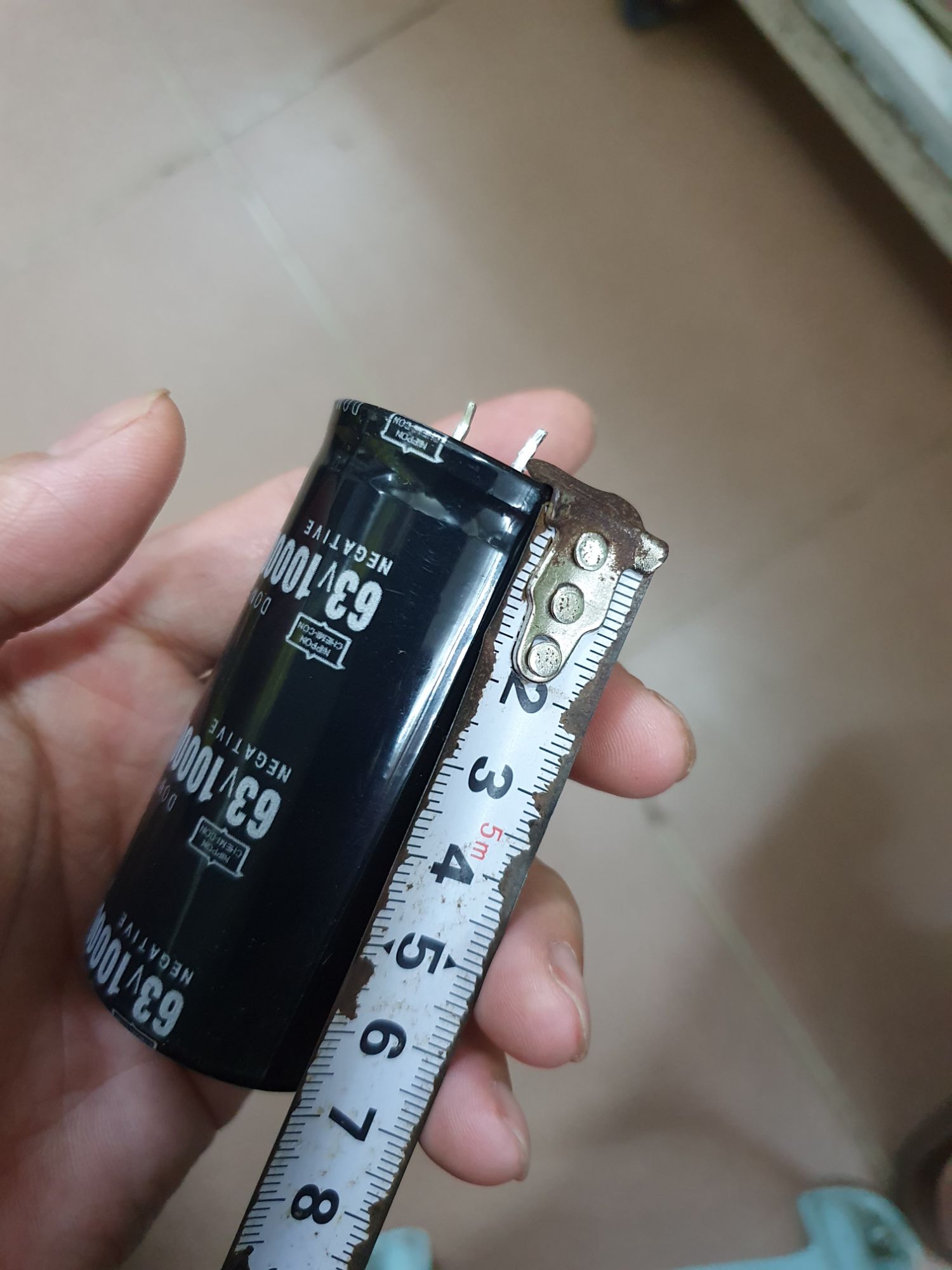 tụ âm ly 10.000mi 63V giá bán 2 con