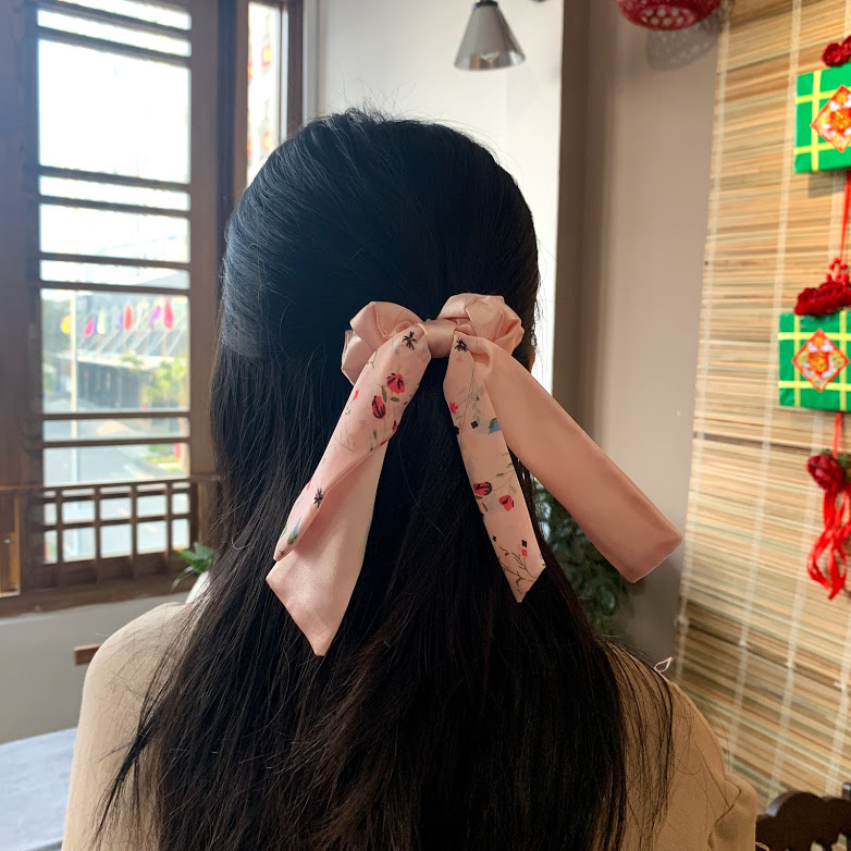 Dây cột tóc pelta scrunchies nơ dài hồng nhạt