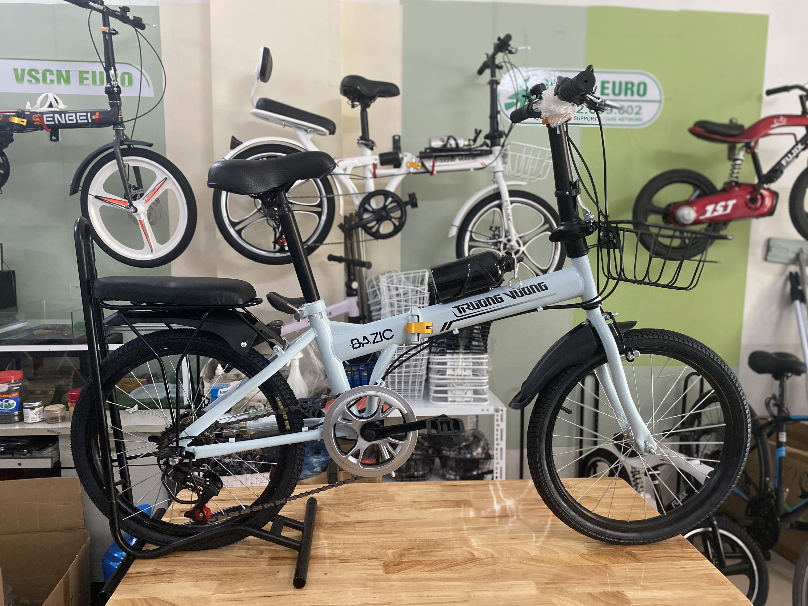 FREESHIPMAX Xe đạp người lớn trẻ em gấp gọn hộp số 7 cấp Shimano chính hãng VSCN EURO, bảo hành 2 năm Toàn quốc.